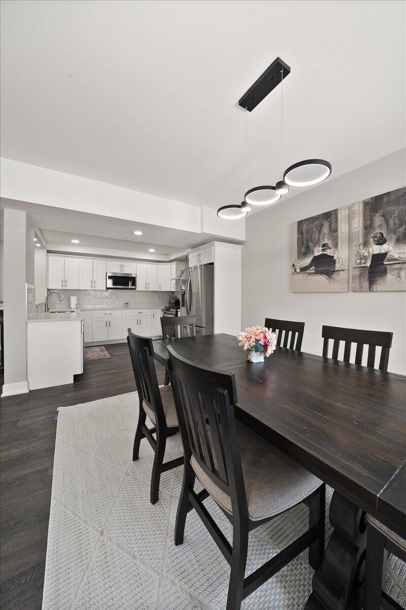9317 Michigan Drive Crown Point, IN 46307 - Photo 30 of 42 a dining room with furniture and window