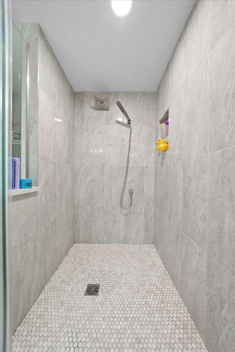 9317 Michigan Drive Crown Point, IN 46307 - Photo 31 of 42 a bathroom with a shower