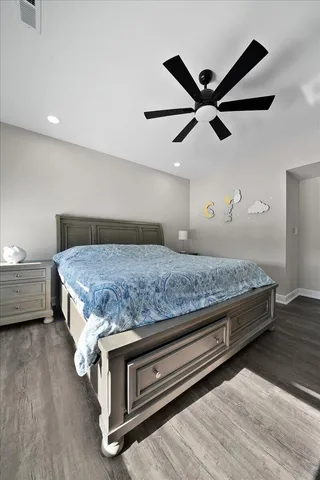 a view of a living room with clothes and shoes