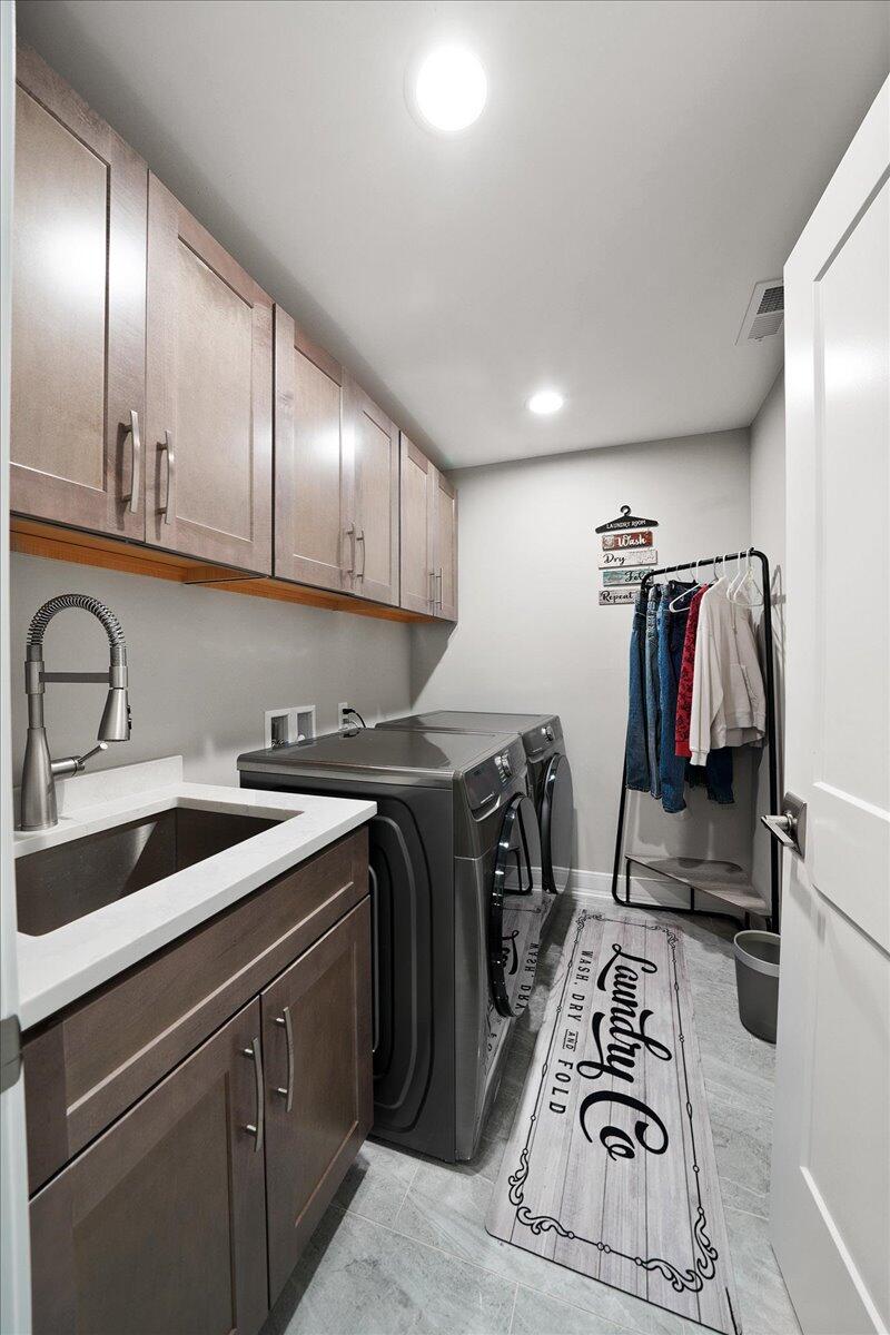 9317 Michigan Drive Crown Point, IN 46307 - Photo 36 of 42 a kitchen with a sink a stove and cabinets
