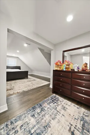 a view of kitchen and empty room