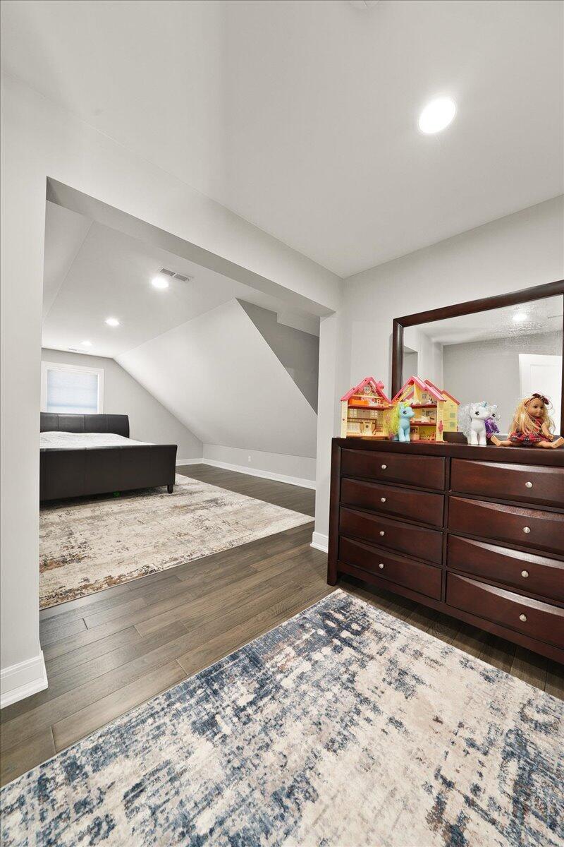 9317 Michigan Drive Crown Point, IN 46307 - Photo 37 of 42 a room with a bed and a dresser