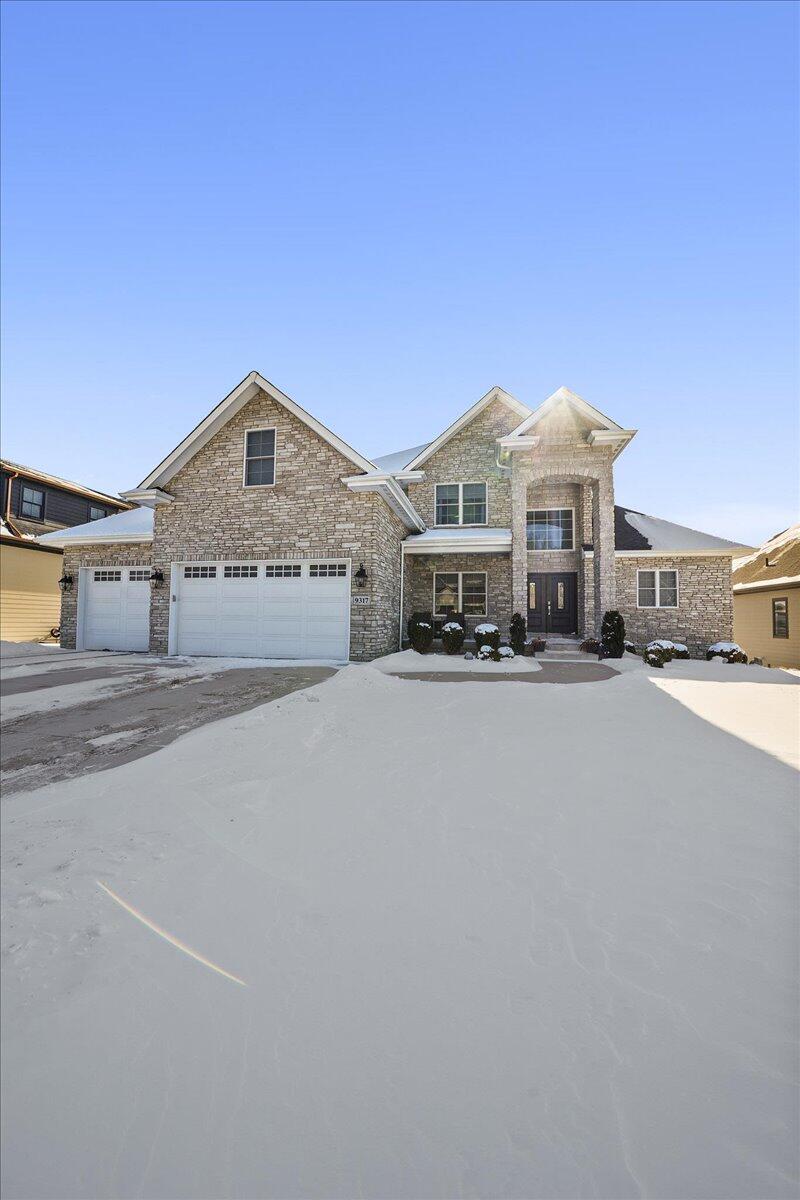 9317 Michigan Drive Crown Point, IN 46307 - Photo 42 of 42 a front view of a house with a street