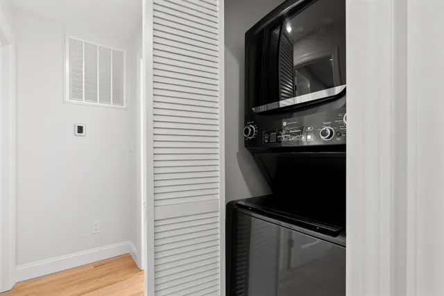 a bathroom with a toilet a sink and bathtub