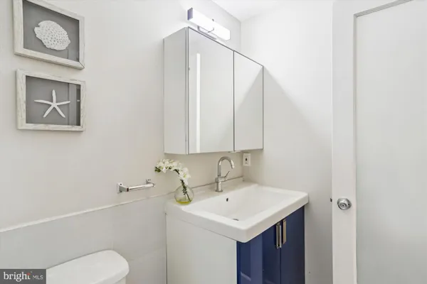 a view of balcony with wooden floor and fence