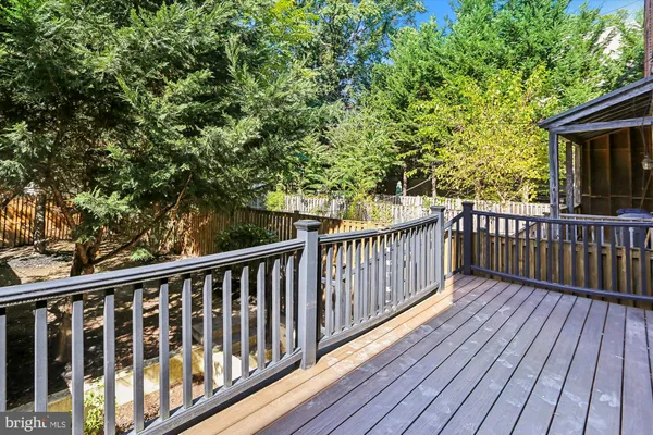 a view of balcony with wooden floor