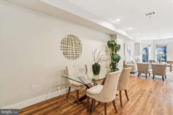 a workspace with furniture and a potted plant