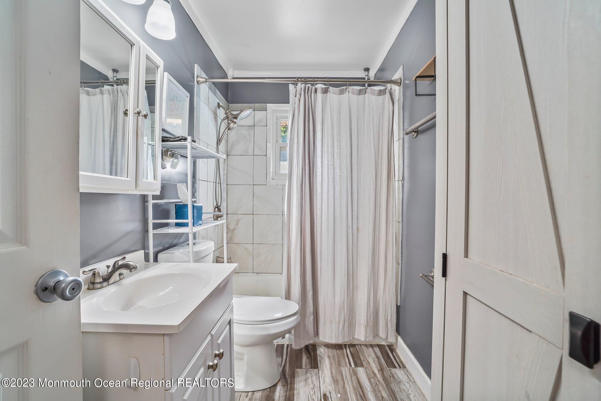 819 Shore Concourse Keyport, NJ 07735 - Photo 12 of 26 a bathroom with a sink toilet and shower
