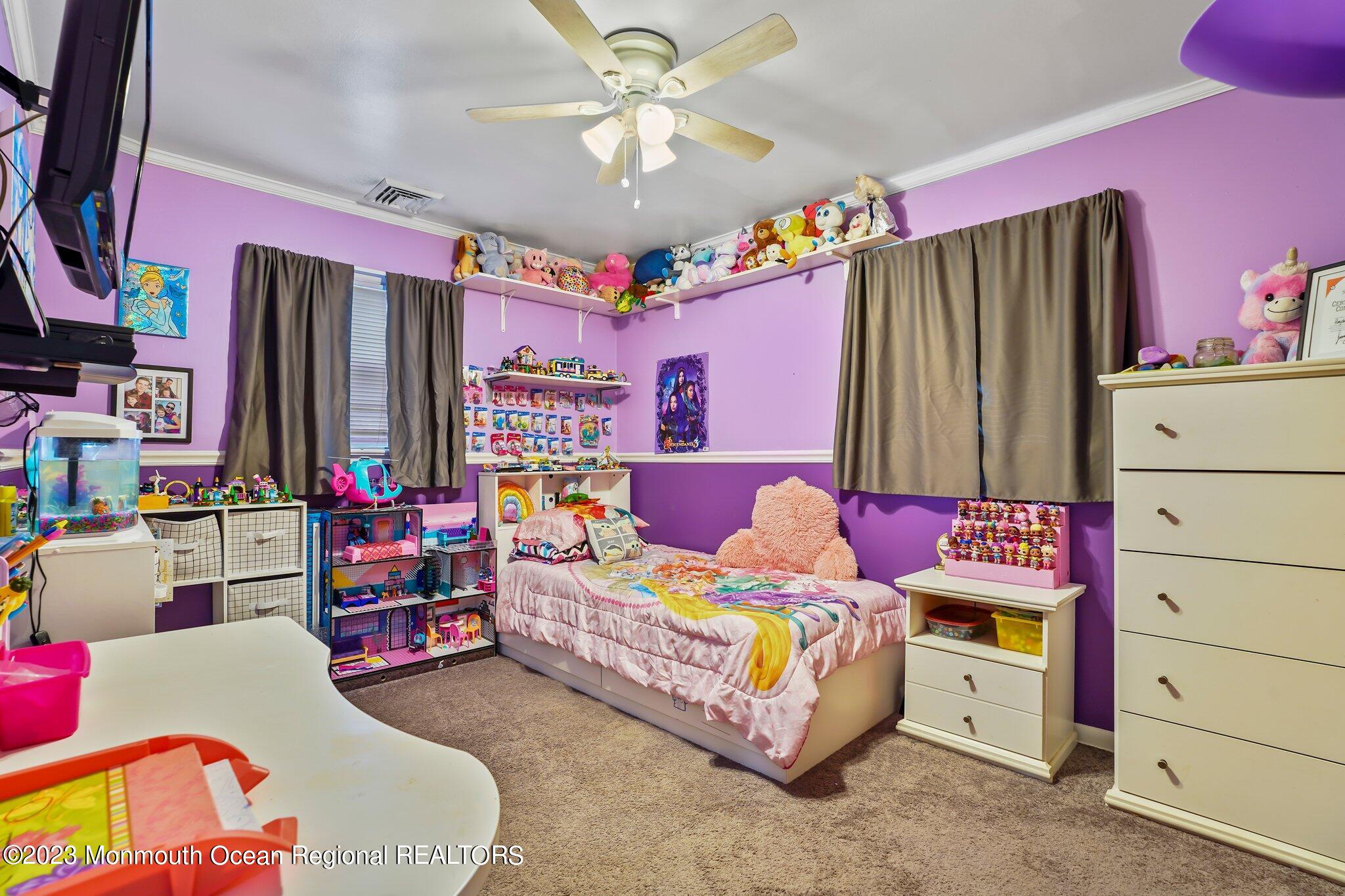819 Shore Concourse Keyport, NJ 07735 - Photo 15 of 26 a bedroom with a bed dresser and a window