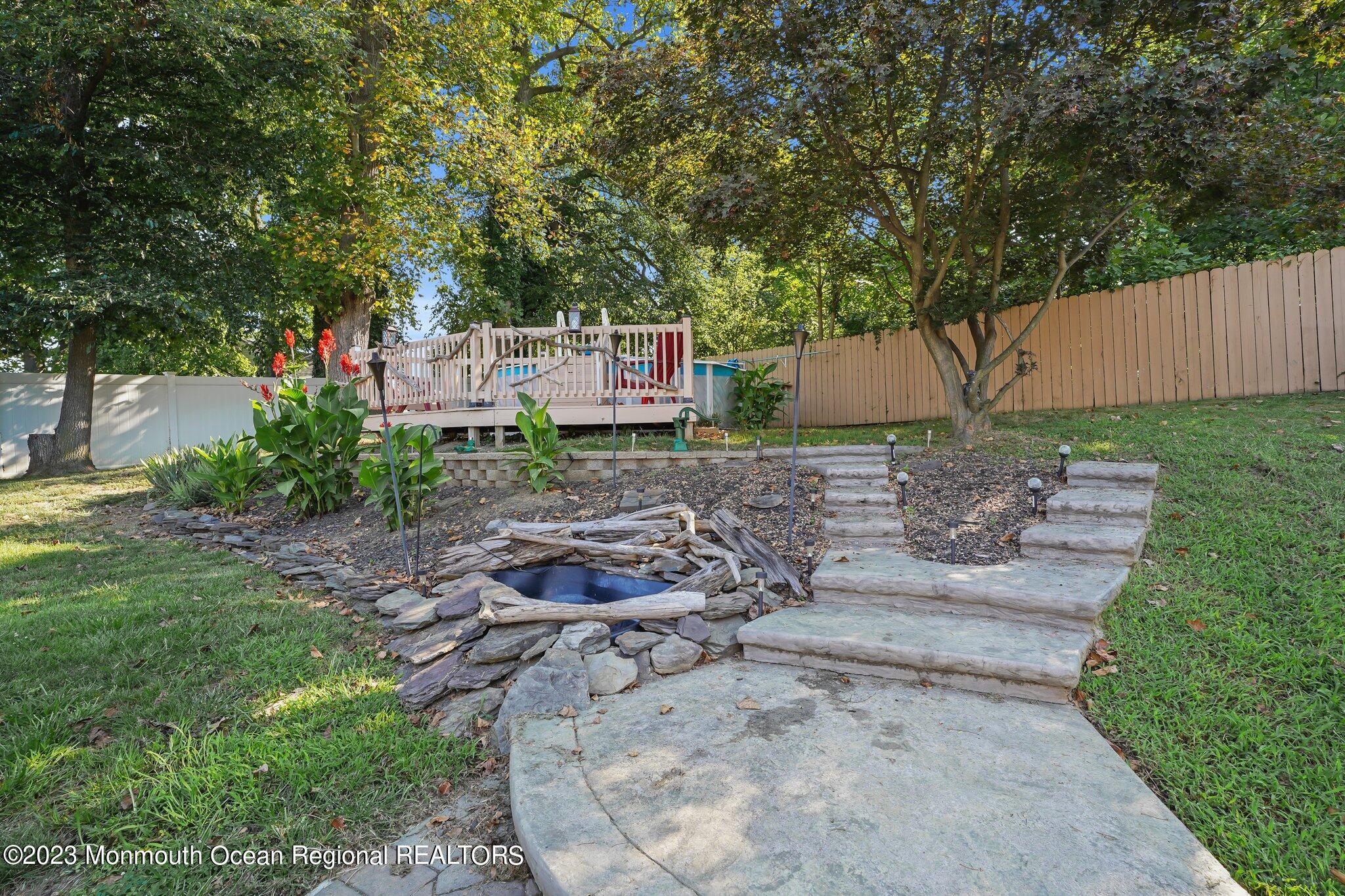 819 Shore Concourse Keyport, NJ 07735 - Photo 23 of 26 a front view of a house with garden