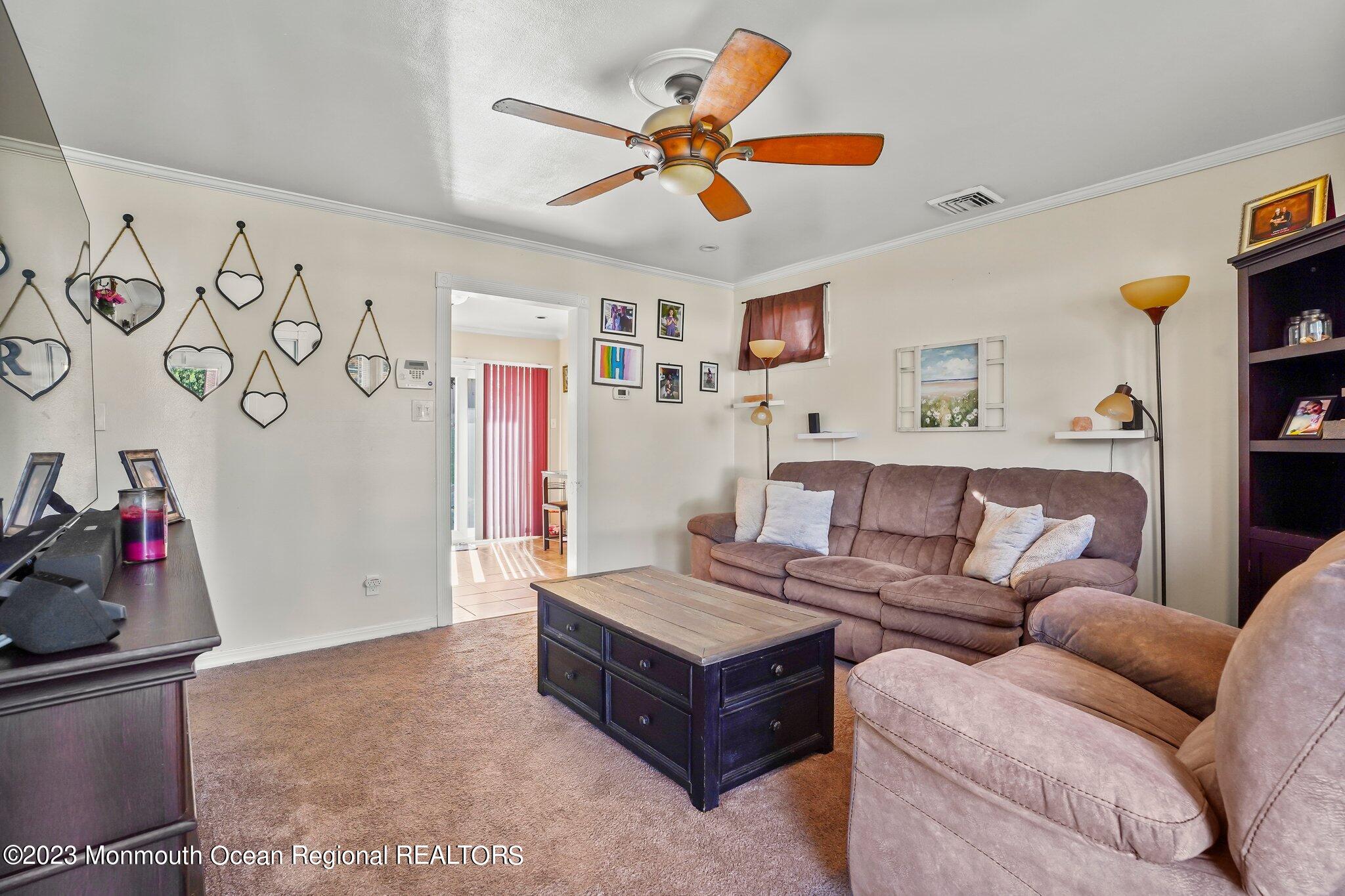 819 Shore Concourse Keyport, NJ 07735 - Photo 6 of 26 a living room with furniture and ceiling fan