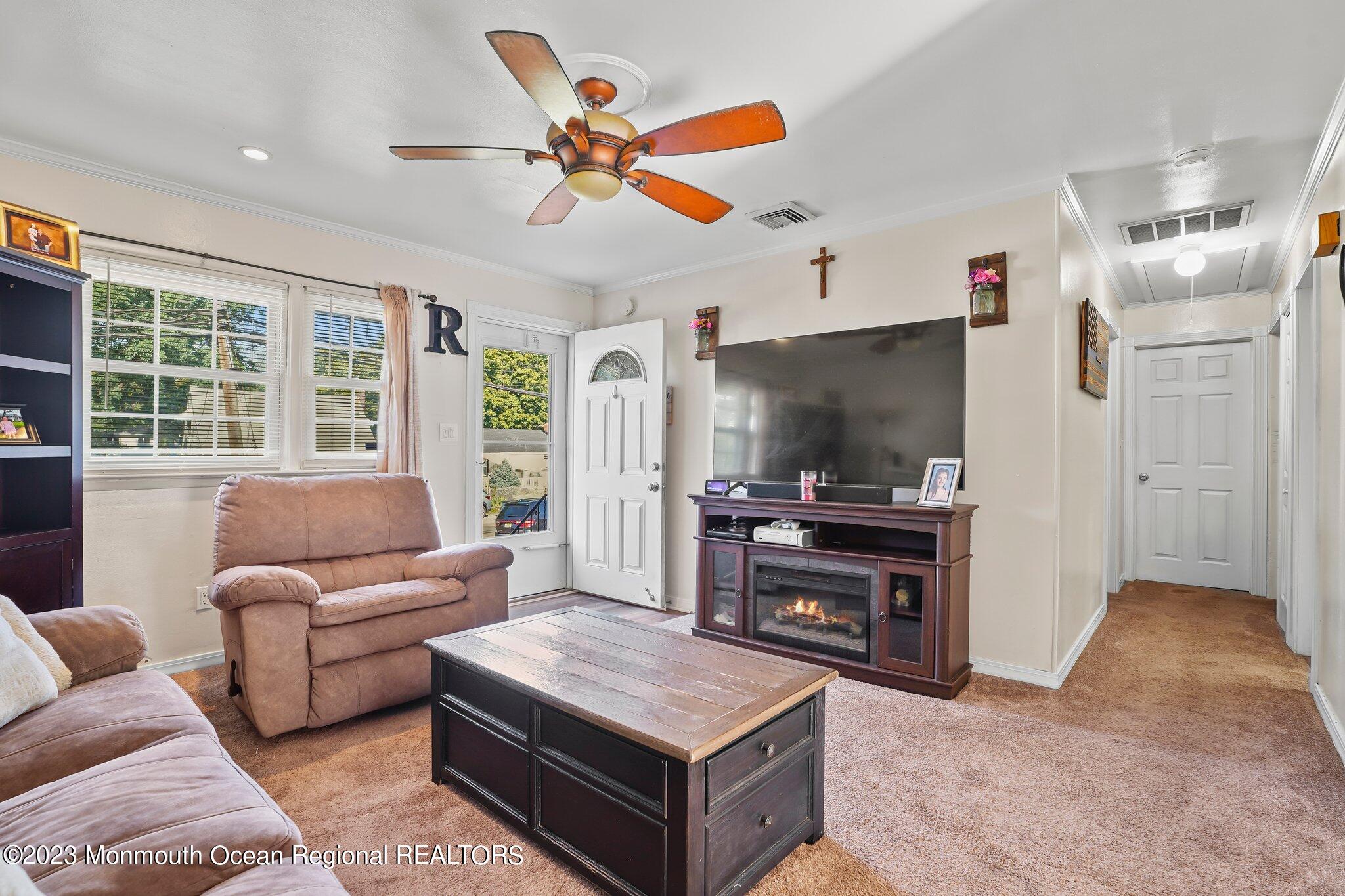 819 Shore Concourse Keyport, NJ 07735 - Photo 7 of 26 a living room with furniture and a flat screen tv