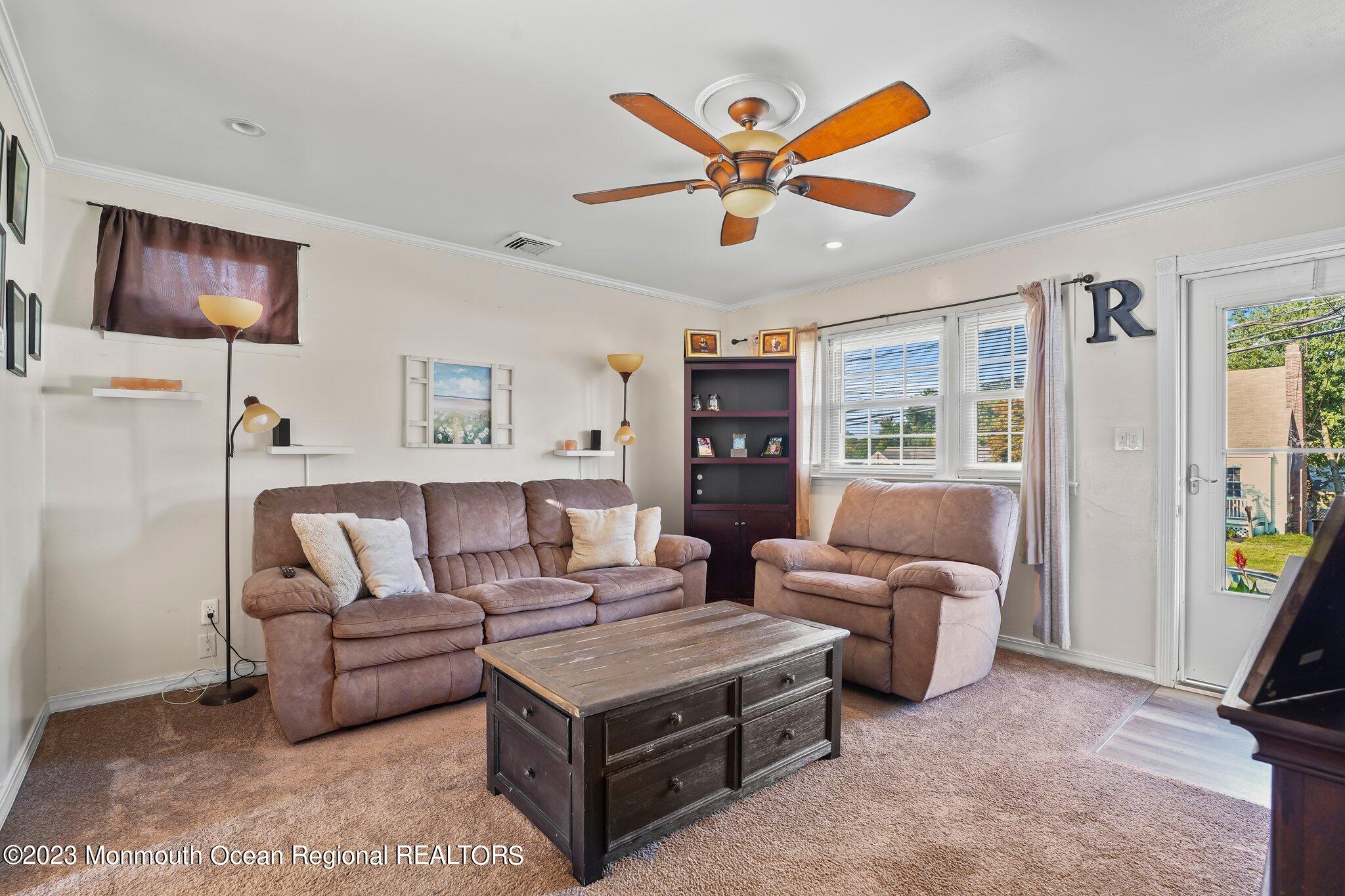 819 Shore Concourse Keyport, NJ 07735 - Photo 8 of 26 a living room with furniture and a large window