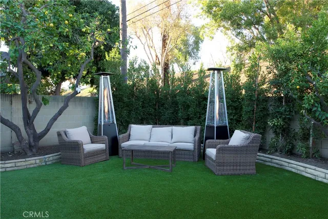a view of a patio with couches and a patio