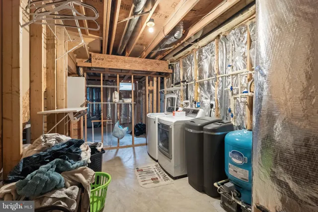 a view of a balcony with chairs and furniture