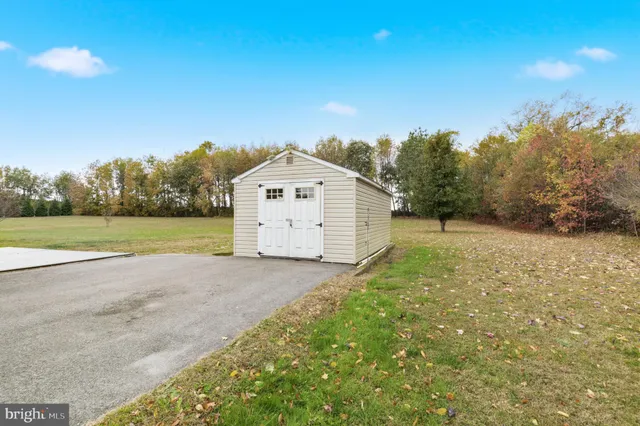 a view of a back yard of the house