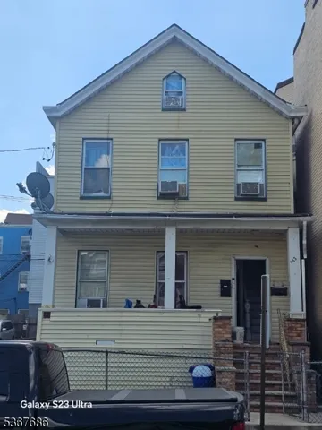 a front view of a house with a garage