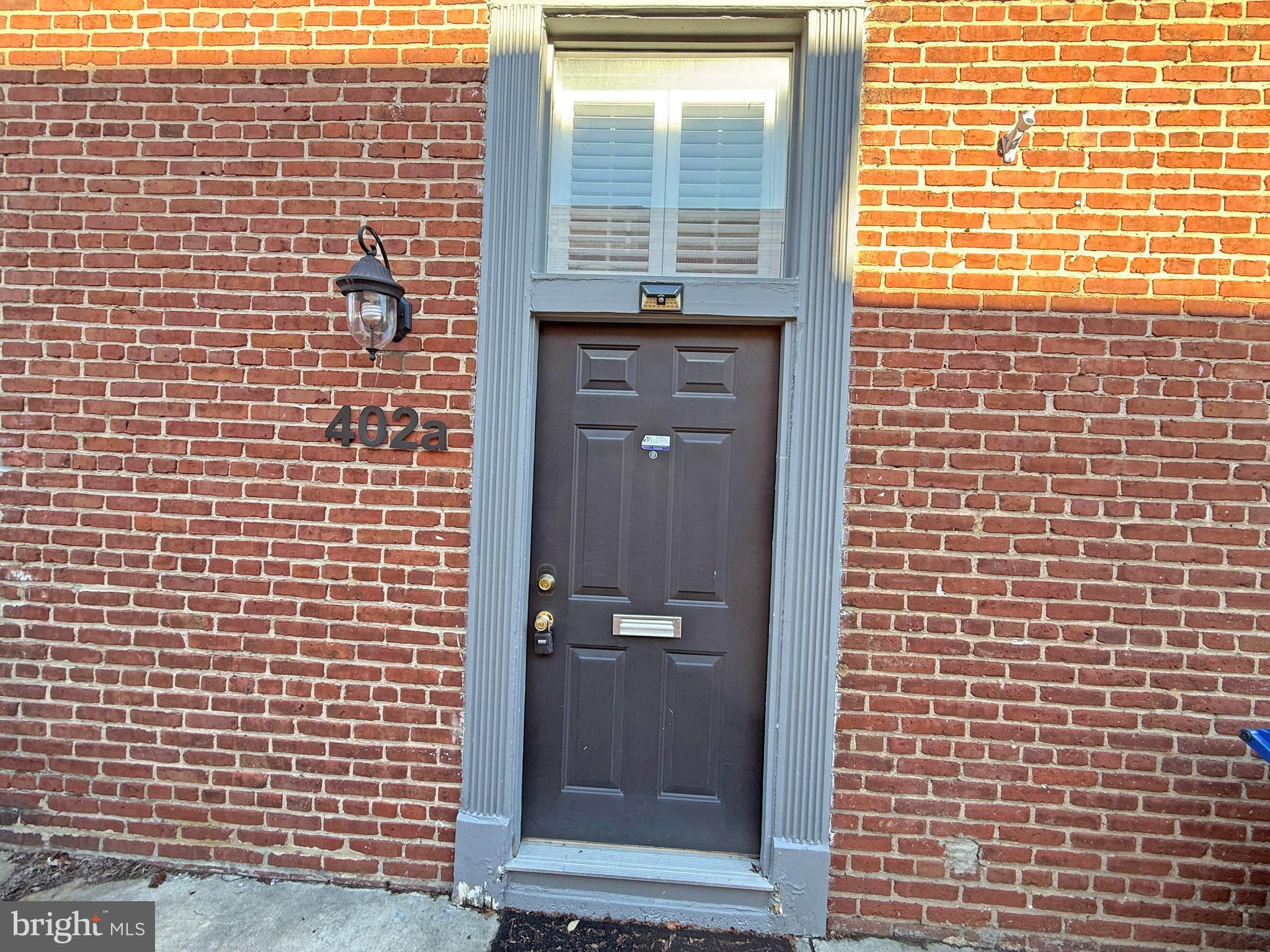 402 Grindall Street, Unit A Baltimore, MD 21230 - Photo 2 of 18 a view of a brick wall