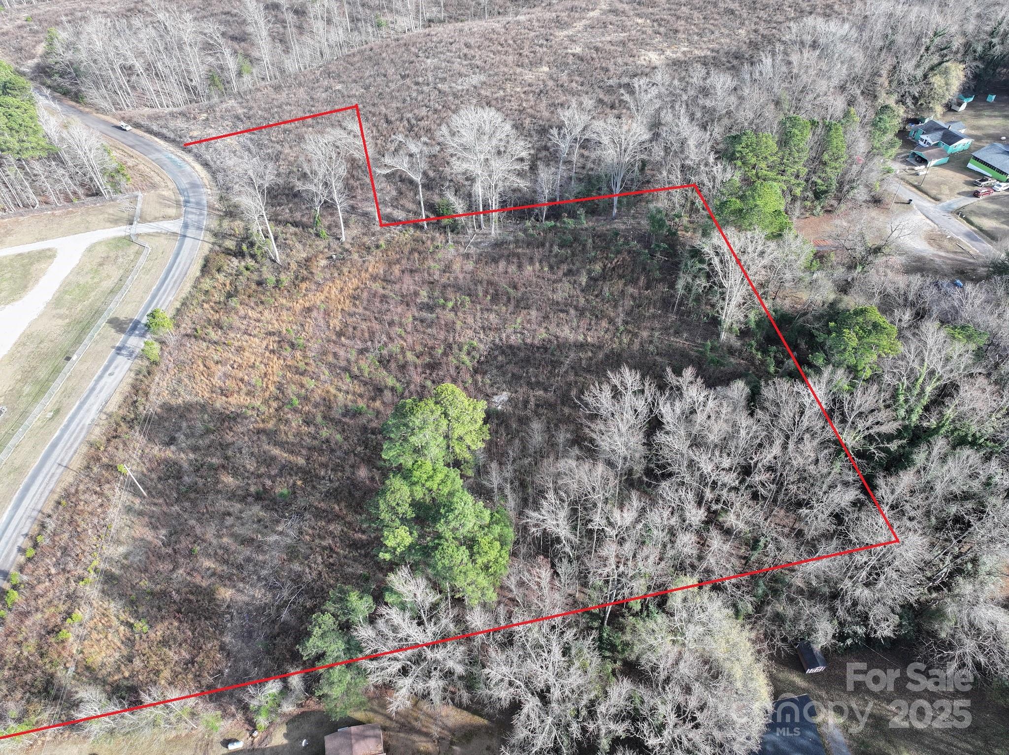 Tbd Tbd Anson Apparel Shirt Road Wadesboro, NC 28170 - Photo 9 of 9 a view of entryway with flower plants