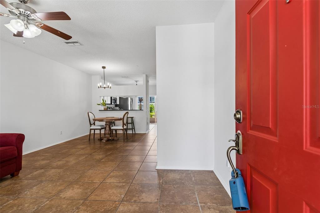 382 Countryside Key Boulevard Oldsmar, FL 34677 - Photo 5 of 58 a view of dining room with a table and chairs