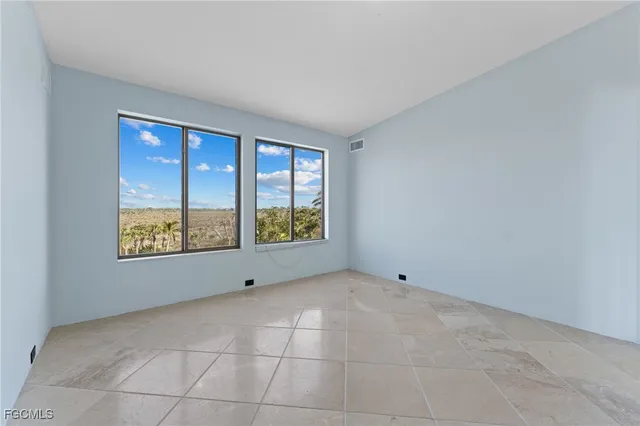 a bathroom with a sink and a large mirror