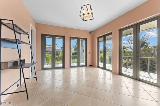 a view of entryway and hall with a front door