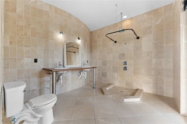 an empty room with fireplace and empty room