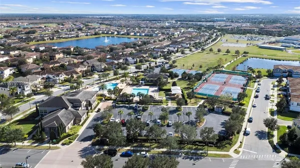 an aerial view of residential building and parking space