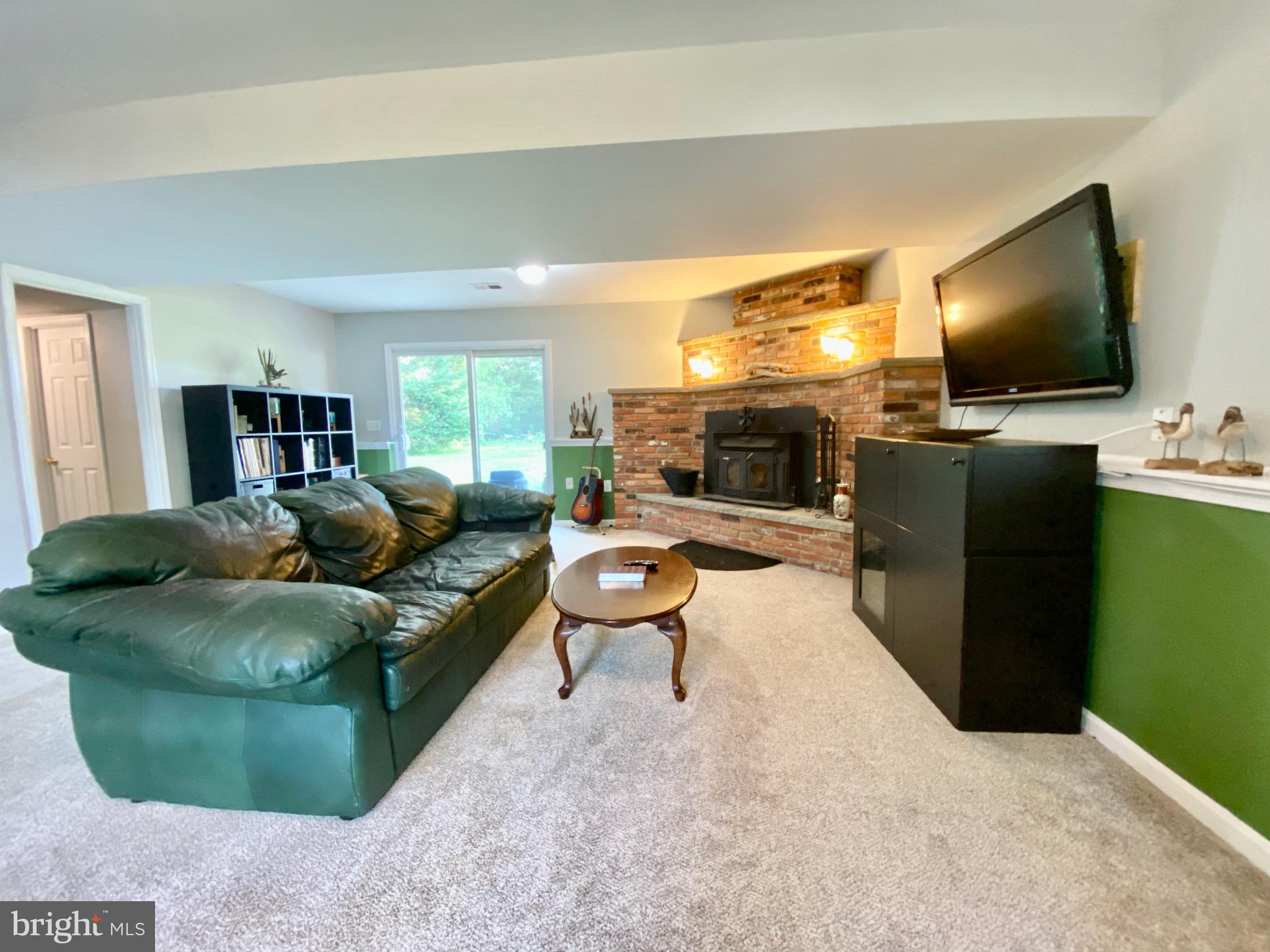 511 Chesapeake Avenue Stevensville, MD 21666 - Photo 8 of 58 Lower level family room
