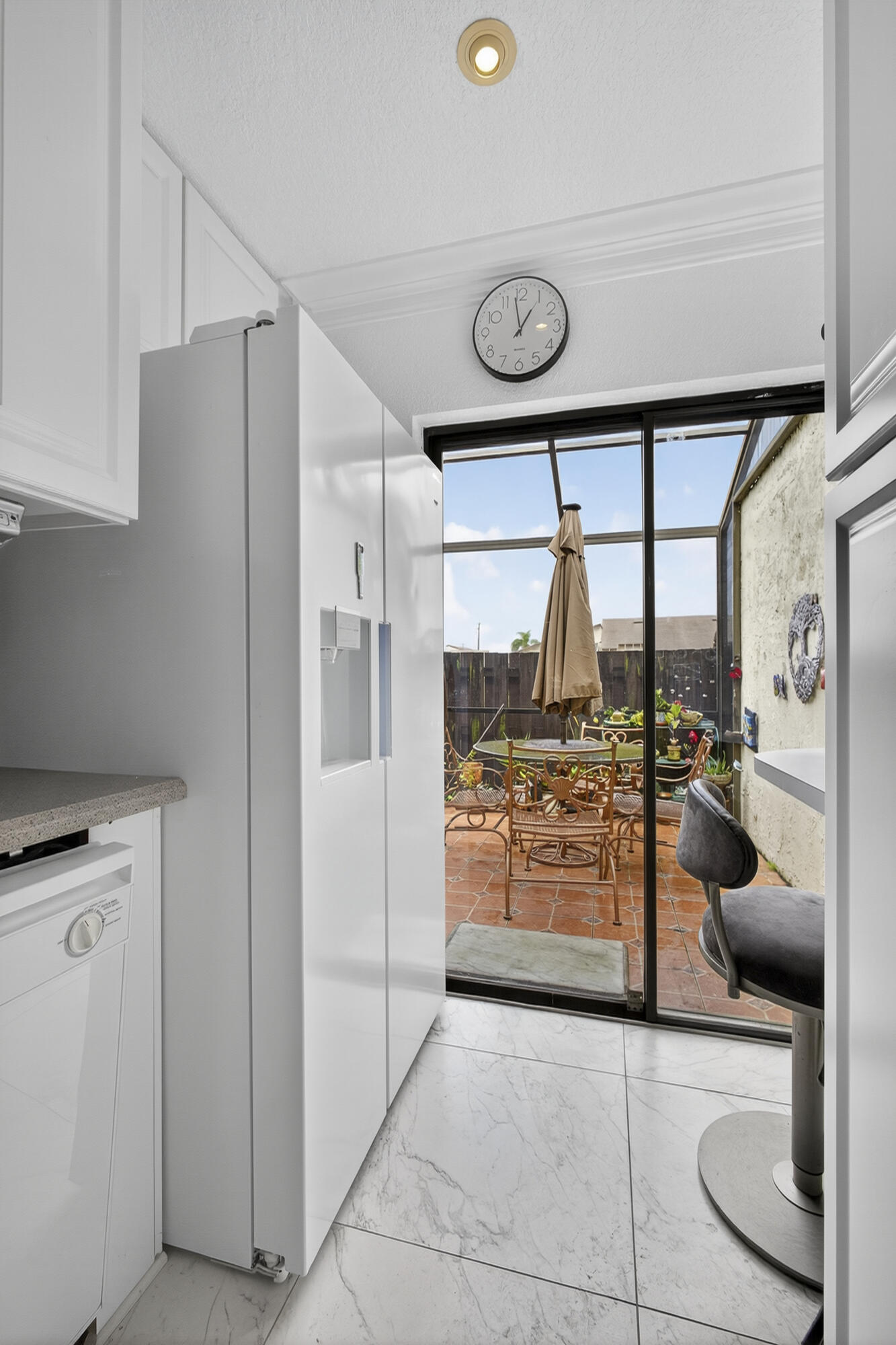 13971 Nesting Way, Unit D Delray Beach, FL 33484 - Photo 13 of 26 Sliders to otside