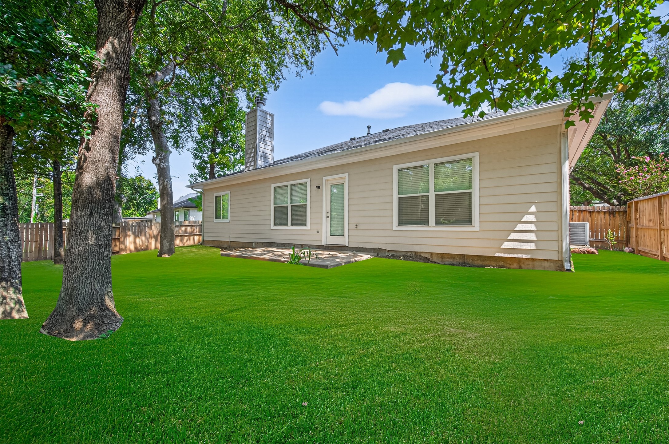 22215 Jay Drive Spring, TX 77373 - Photo 21 of 21 a view of a house with a backyard
