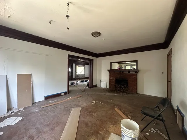 a spacious bathroom with a sink and a mirror