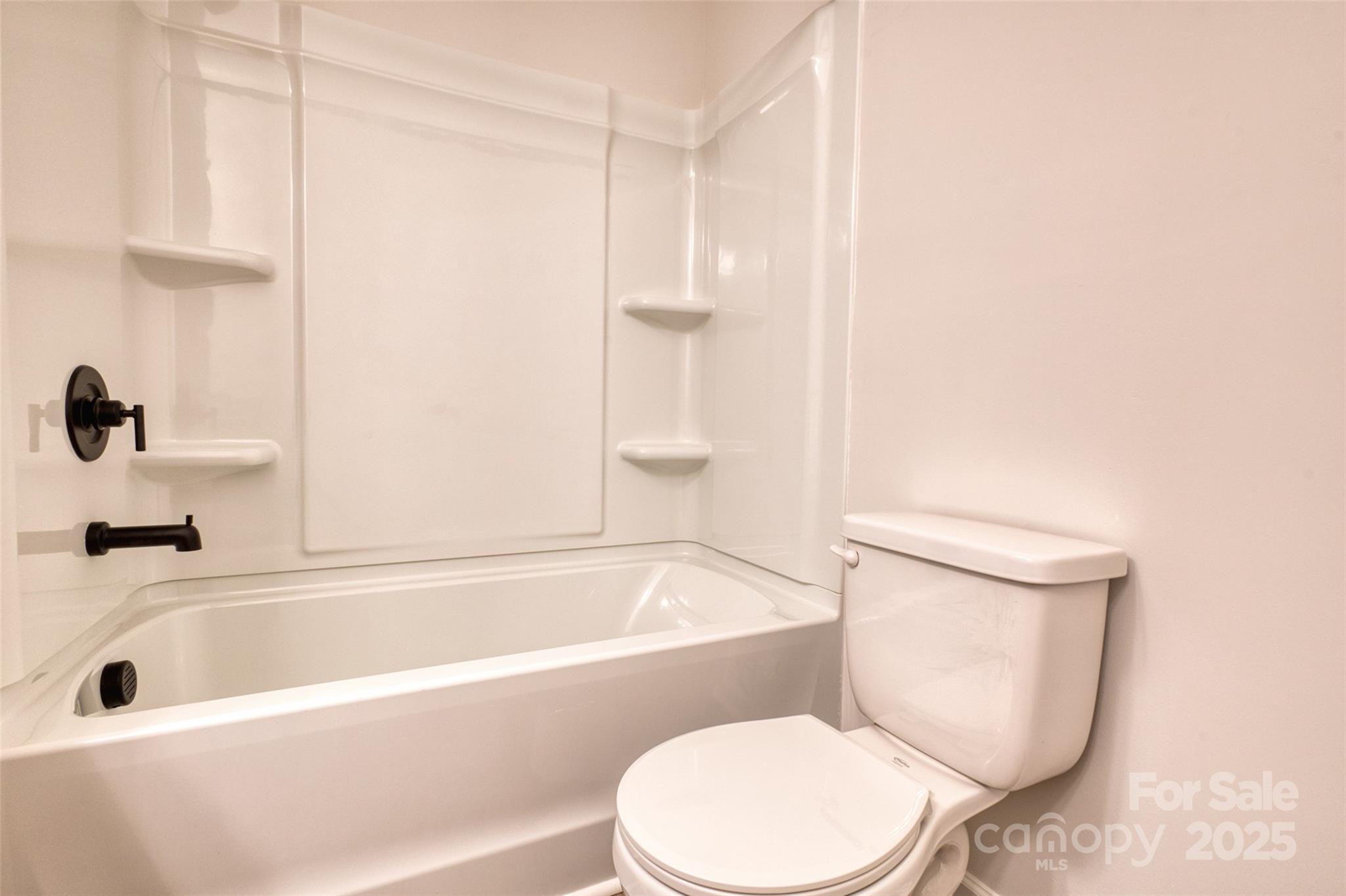 1541 Riverview Circle Fort Lawn, SC 29714 - Photo 28 of 48 a bathroom with a toilet and a bathtub