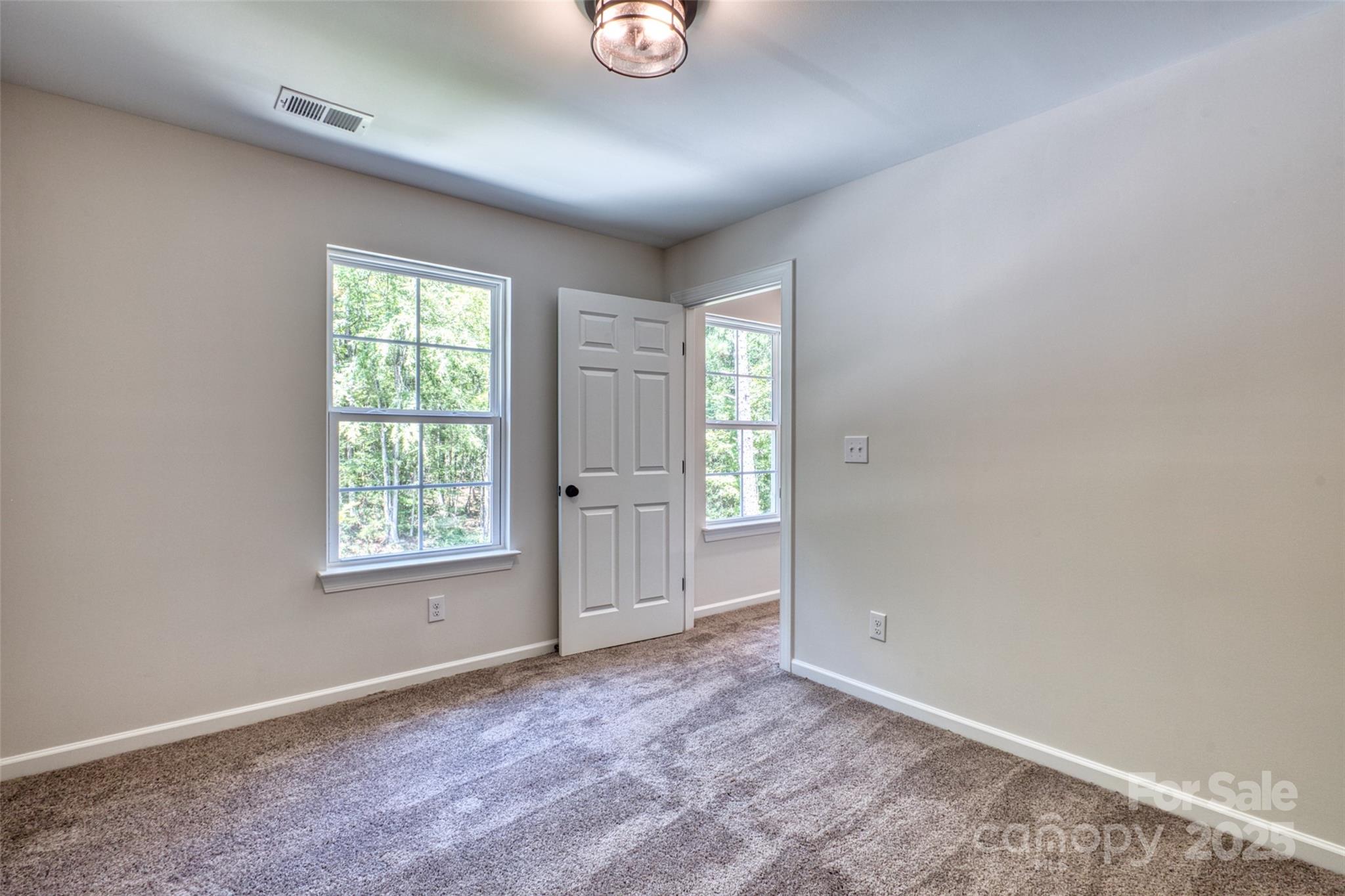 1541 Riverview Circle Fort Lawn, SC 29714 - Photo 38 of 48 an empty room with windows