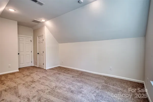 an empty room with an entryway