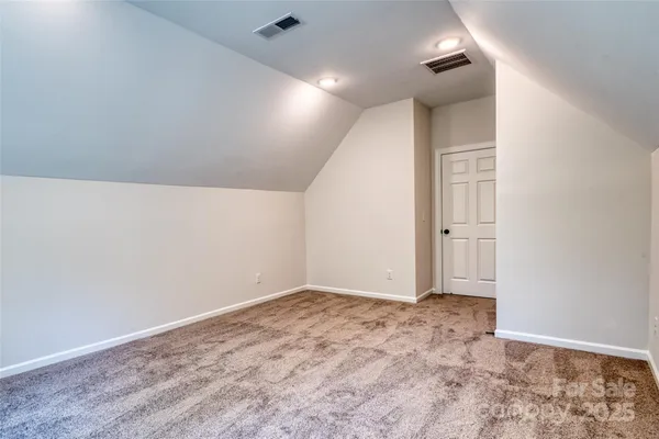 a view of room with garage