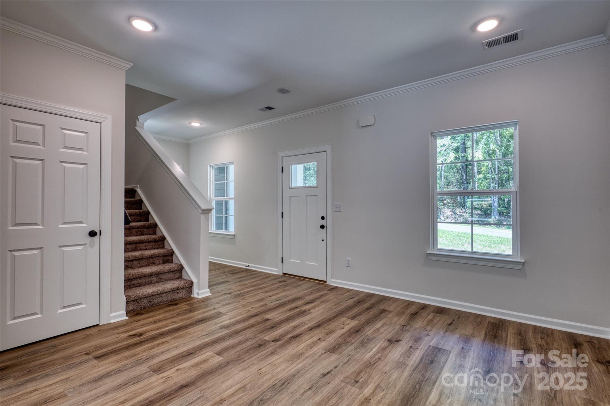 1541 Riverview Circle Fort Lawn, SC 29714 - Photo 8 of 48 wooden floor in an empty room with a window