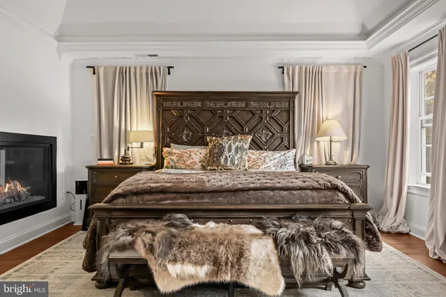 a view of a hallway with paintings on the wall