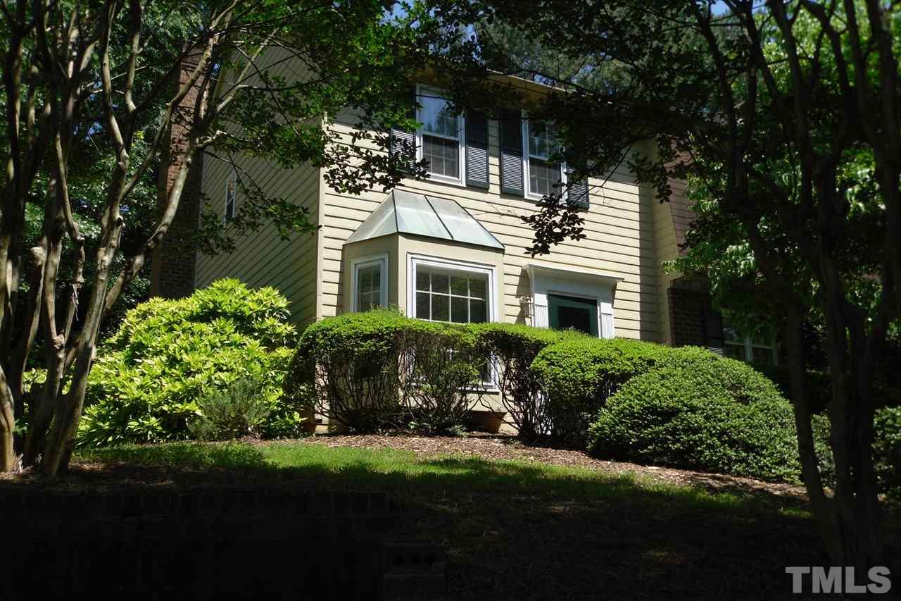1316 Dylan Heath Court Raleigh, NC 27608 - Photo 1 of 17 a house view with a garden space