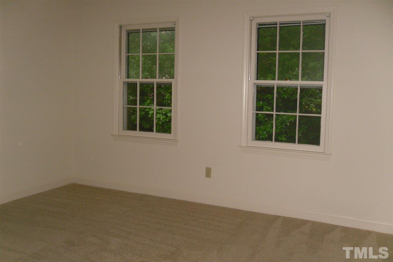 1316 Dylan Heath Court Raleigh, NC 27608 - Photo 12 of 17 an empty room with a window