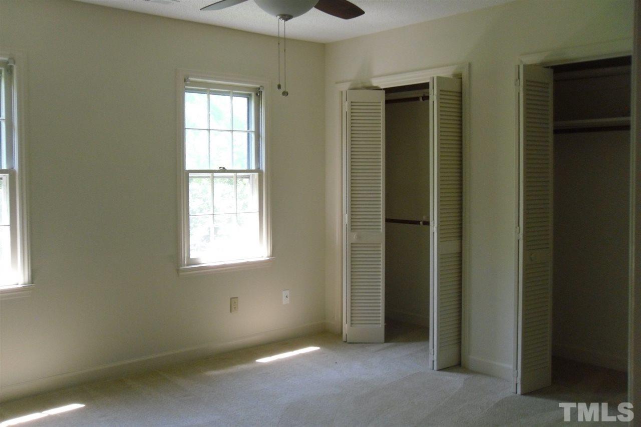 1316 Dylan Heath Court Raleigh, NC 27608 - Photo 17 of 17 an empty room that has a window