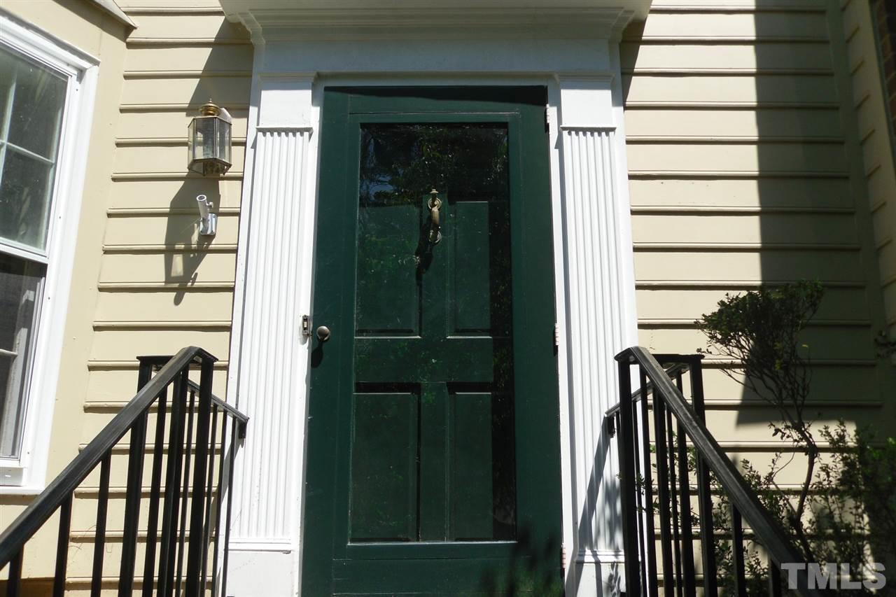 1316 Dylan Heath Court Raleigh, NC 27608 - Photo 3 of 17 a view of entryway with a front door