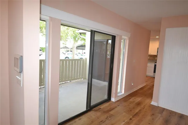 a view of entryway with wooden floor