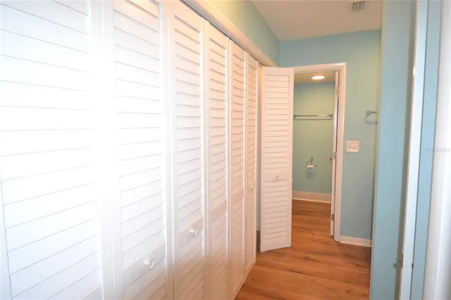 a bathroom with a shower and a sink