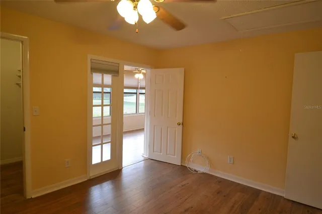 a view of entryway with wooden floor