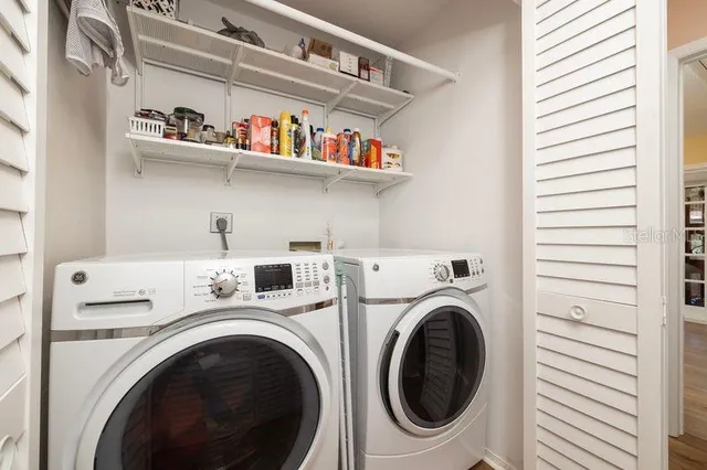 a utility room with dryer and washer