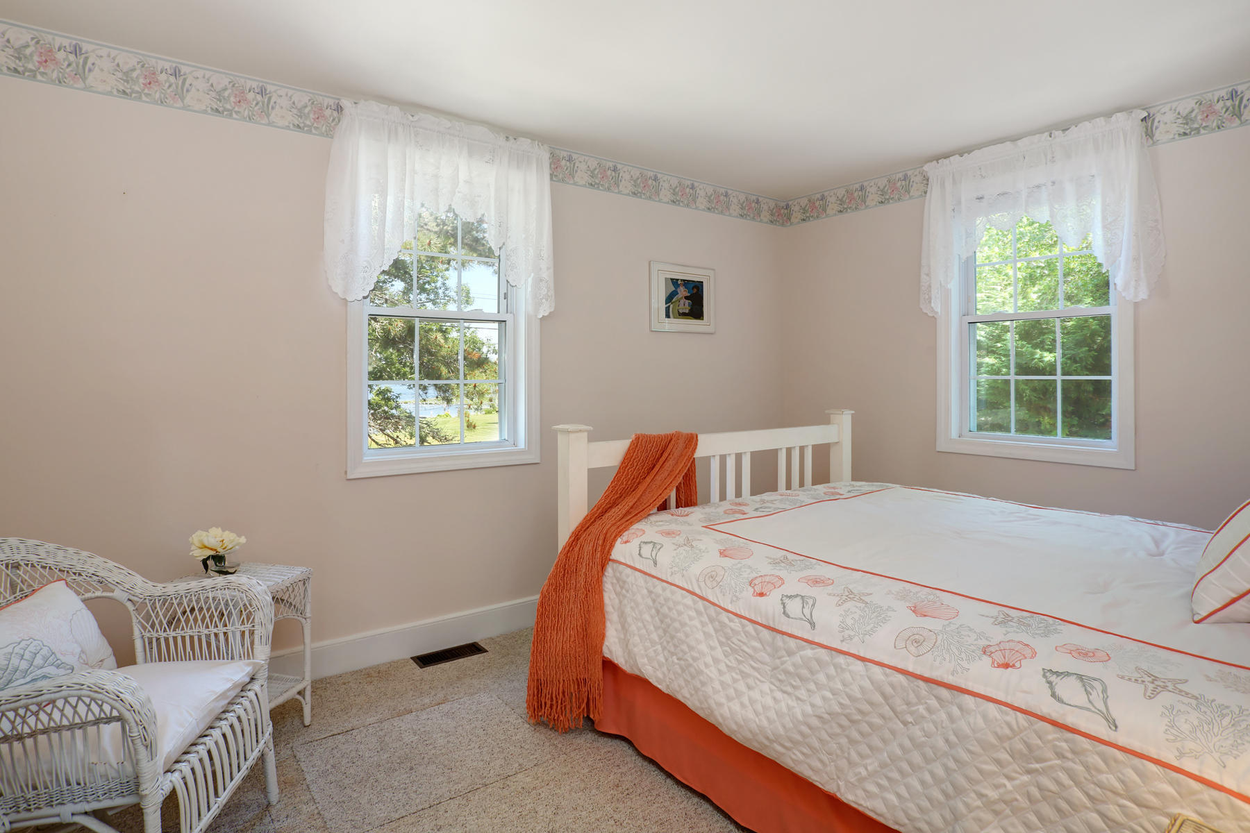 256 Monomoscoy Road Mashpee, MA 02649 - Photo 13 of 28 a bedroom with a bed and a window