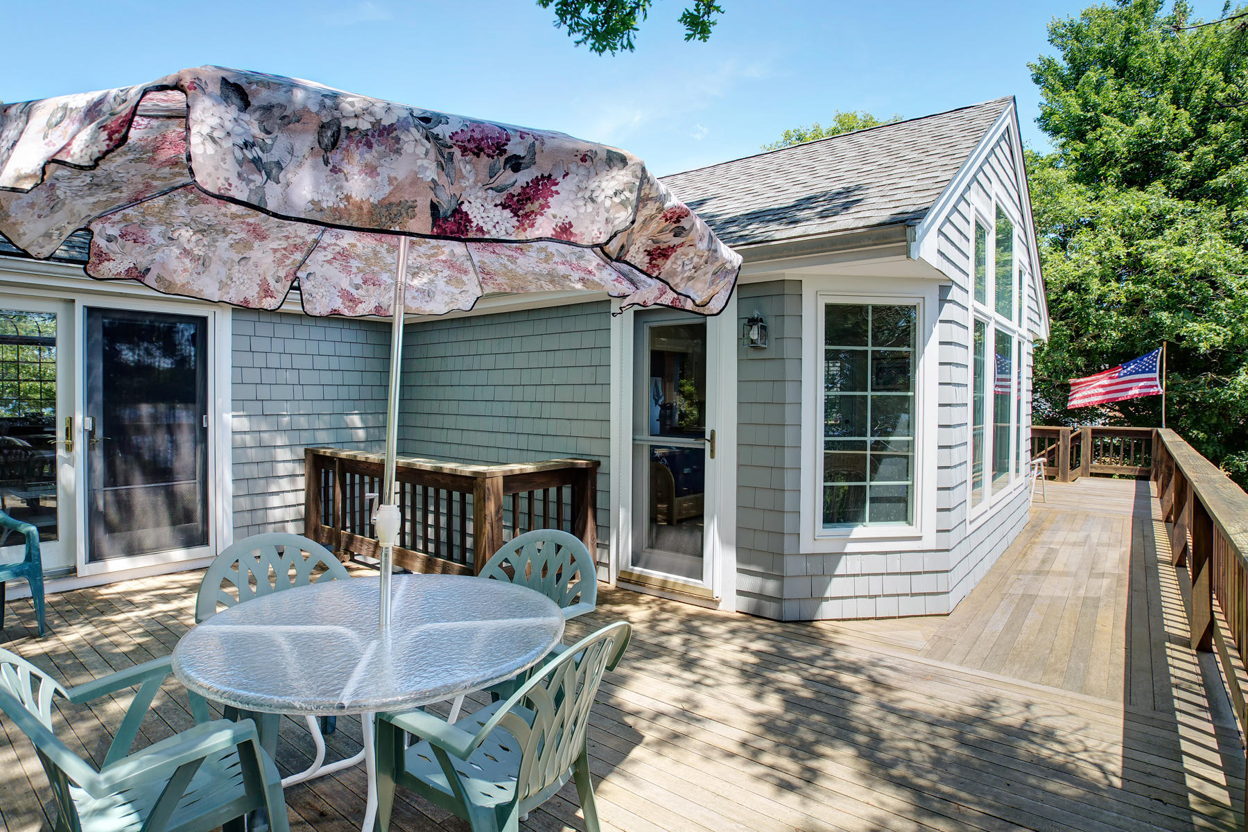 256 Monomoscoy Road Mashpee, MA 02649 - Photo 24 of 28 a view of house with a outdoor seating