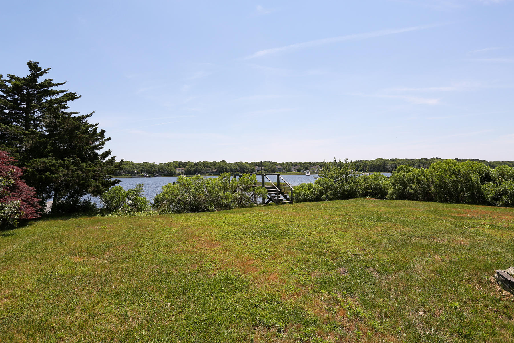 256 Monomoscoy Road Mashpee, MA 02649 - Photo 25 of 28 a view of an outdoor space and a yard