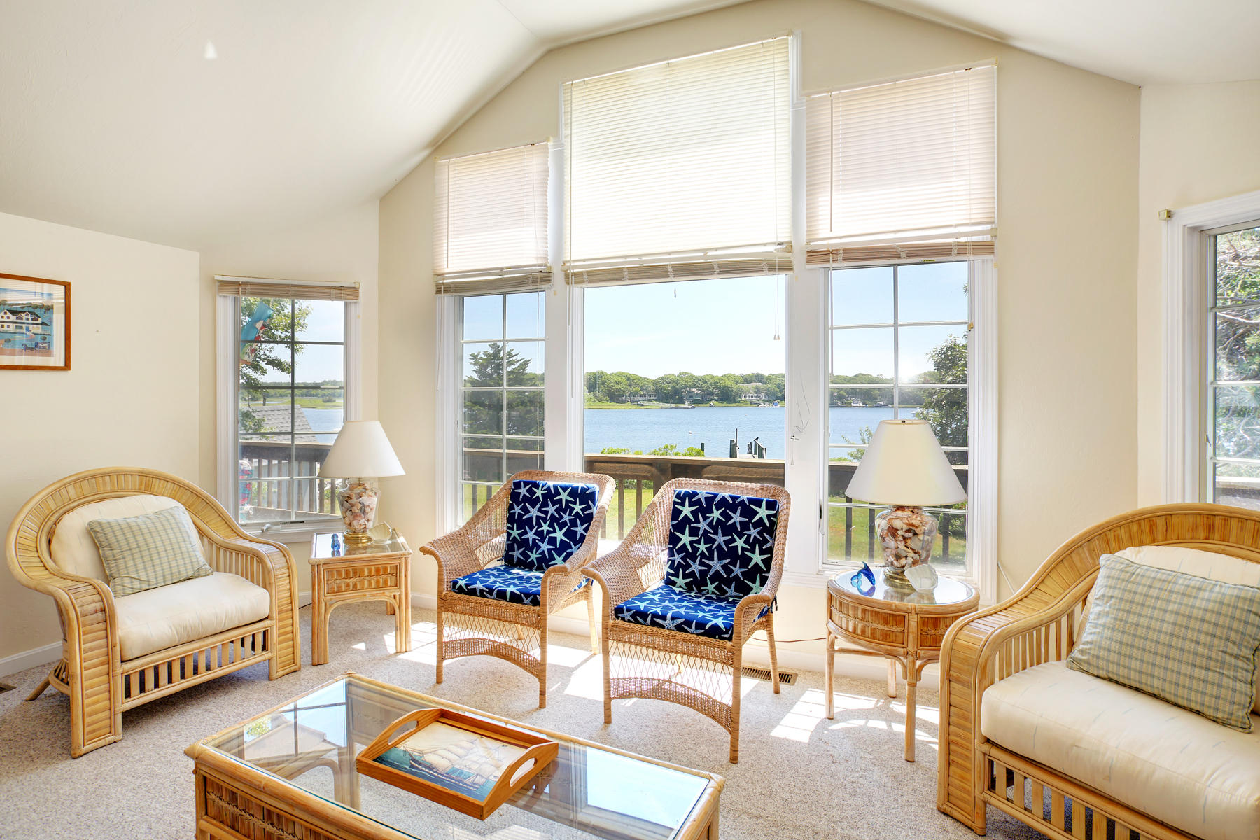 256 Monomoscoy Road Mashpee, MA 02649 - Photo 7 of 28 a living room with furniture and a large window